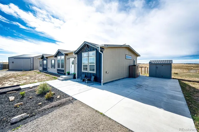 $705,000 | 977 South County Road 149, Strasburg, CO 80136