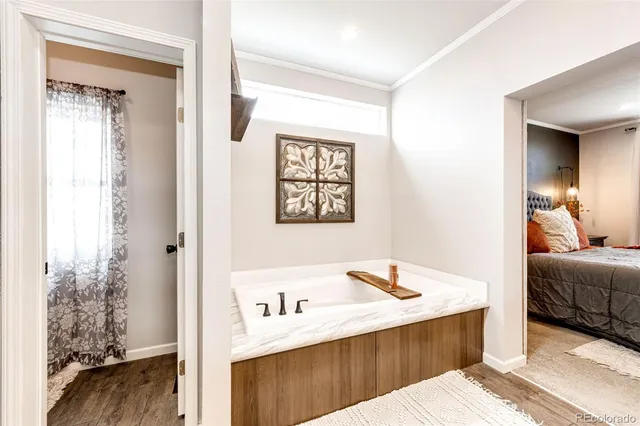 $705,000 | 977 South County Road 149, Strasburg, CO 80136