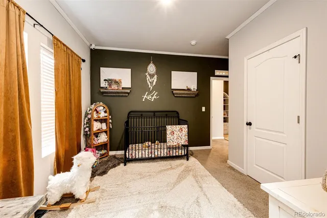 $705,000 | 977 South County Road 149, Strasburg, CO 80136