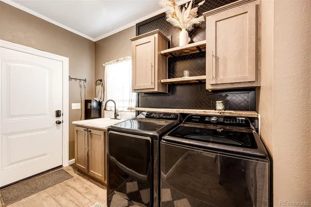 $705,000 | 977 South County Road 149, Strasburg, CO 80136