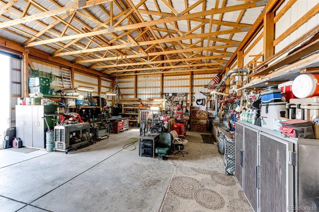 $705,000 | 977 South County Road 149, Strasburg, CO 80136