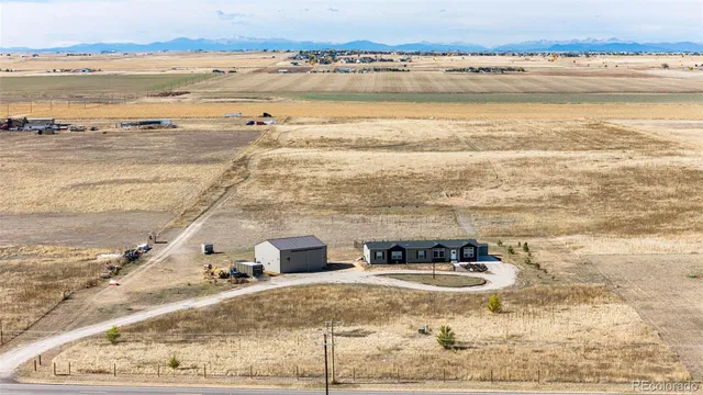 $705,000 | 977 South County Road 149, Strasburg, CO 80136