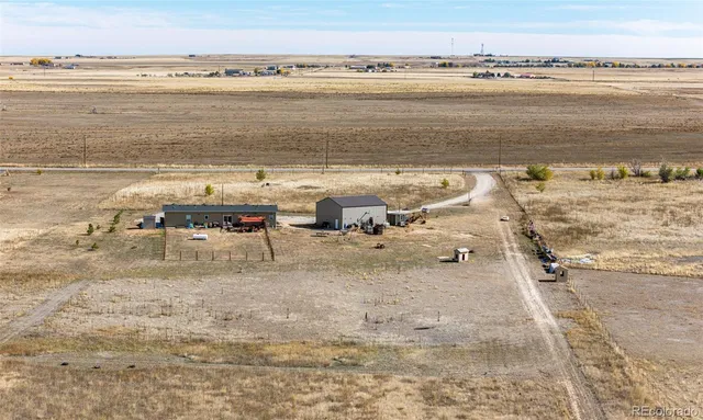 $705,000 | 977 South County Road 149, Strasburg, CO 80136