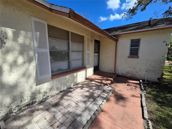 a view of backyard of house