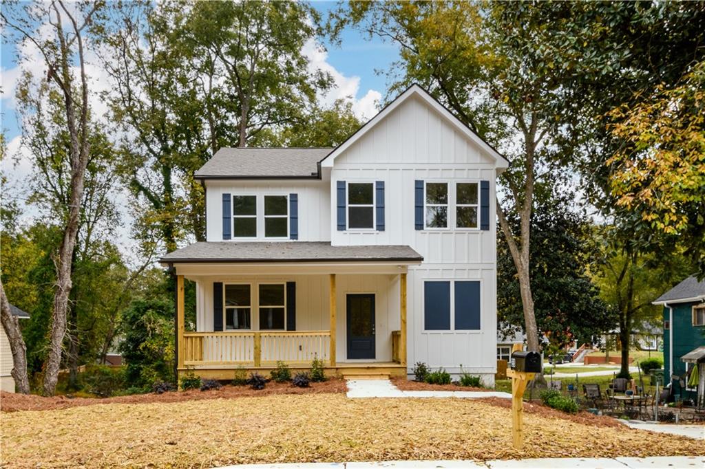 28 Johnson Road Northwest Atlanta, GA 30318 - Photo 1 of 1 a front view of a house with a yard