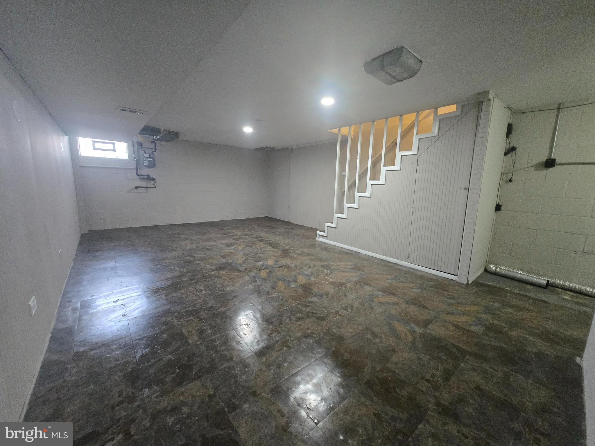 803 North Marlyn Avenue Baltimore, MD 21221 - Photo 13 of 22 an empty room with windows and pillars in it