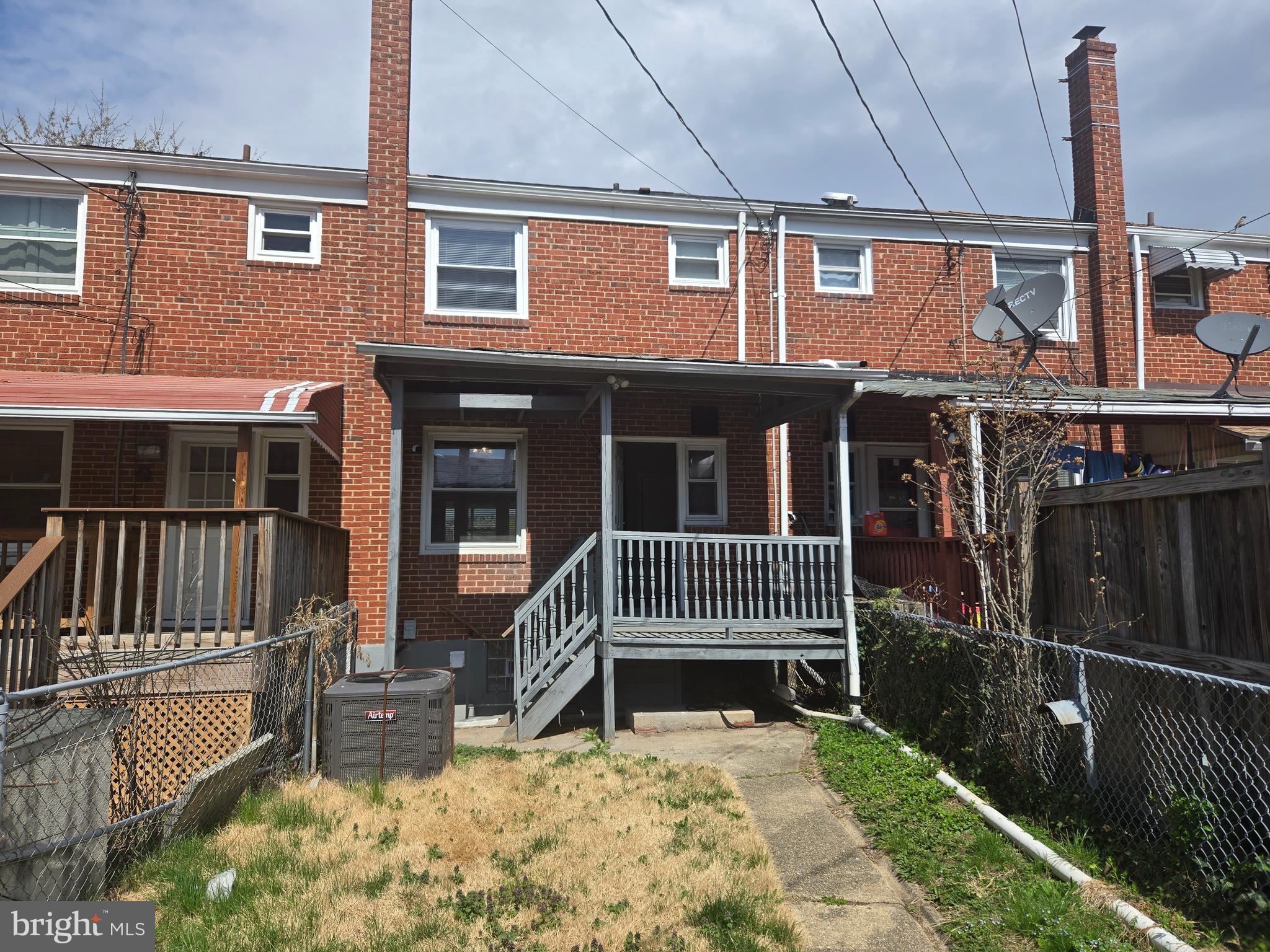 803 North Marlyn Avenue Baltimore, MD 21221 - Photo 21 of 22 front view of a house with a fence