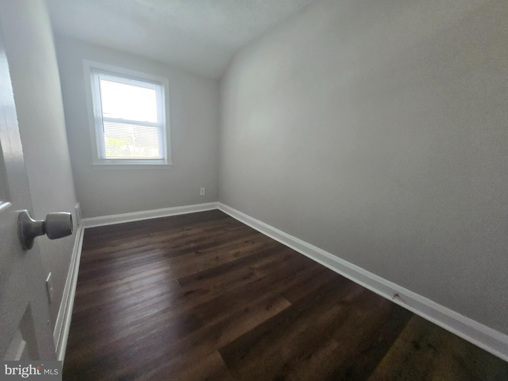 803 North Marlyn Avenue Baltimore, MD 21221 - Photo 9 of 22 wooden floor in an empty room