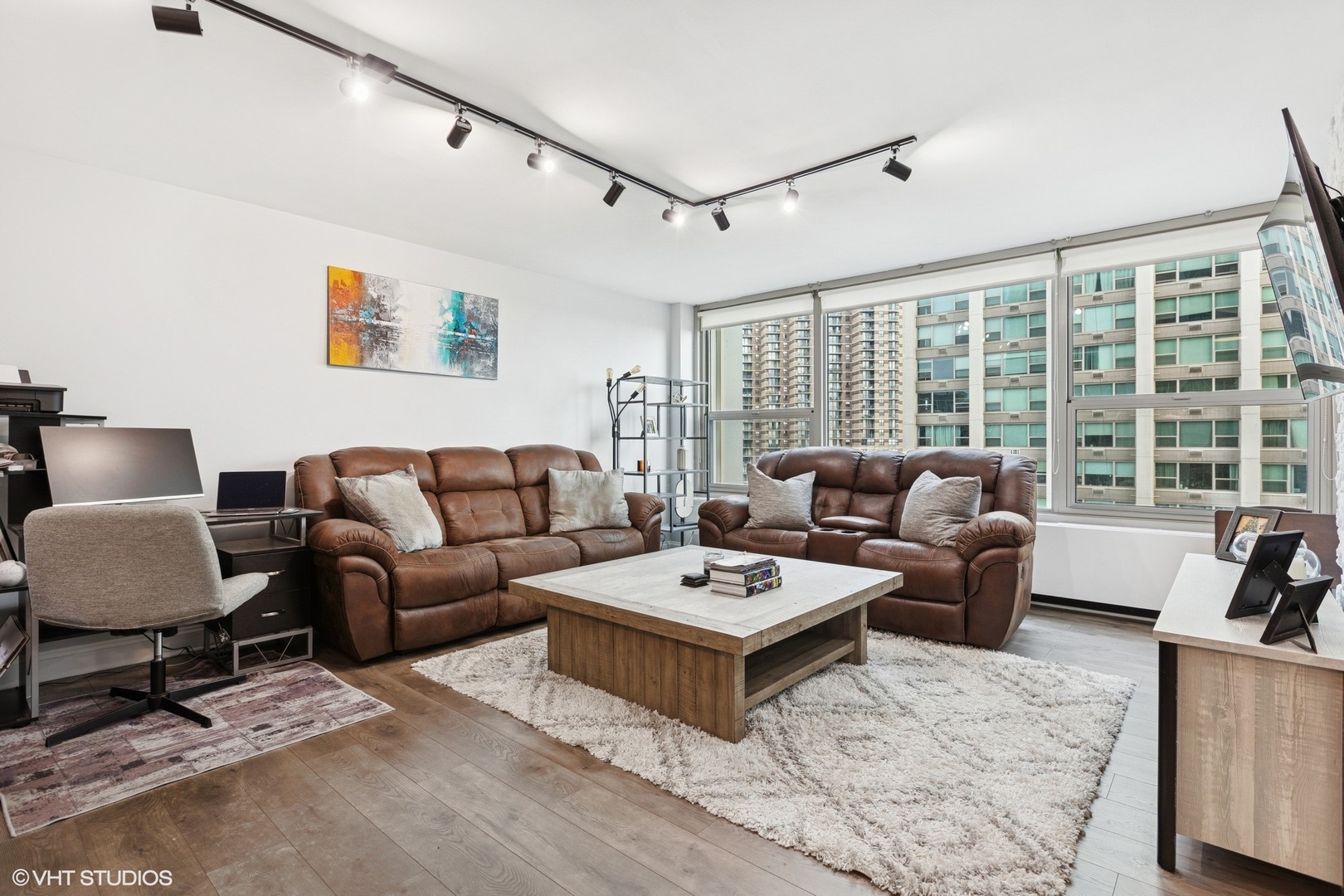 3600 North Lake Shore Drive, Unit 1108 Chicago, IL 60613 - Photo 3 of 12 a living room with furniture and a large window