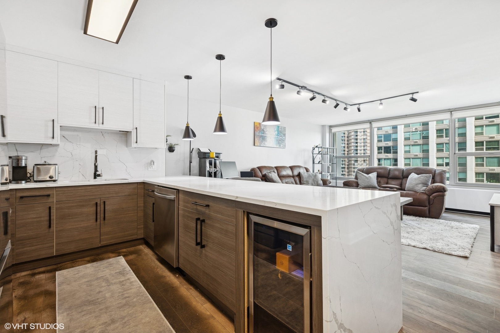 3600 North Lake Shore Drive, Unit 1108 Chicago, IL 60613 - Photo 7 of 12 a kitchen with appliances cabinets and a counter top space