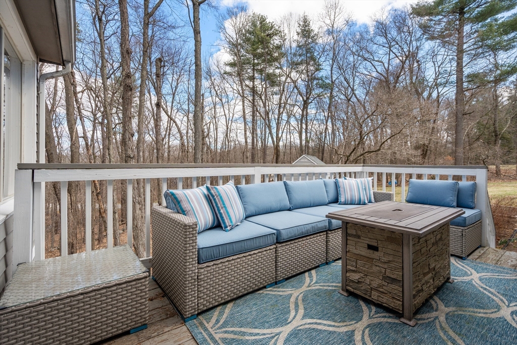 4 Greybirch Road Andover, MA 01810 - Photo 21 of 42 a view of a patio on the deck