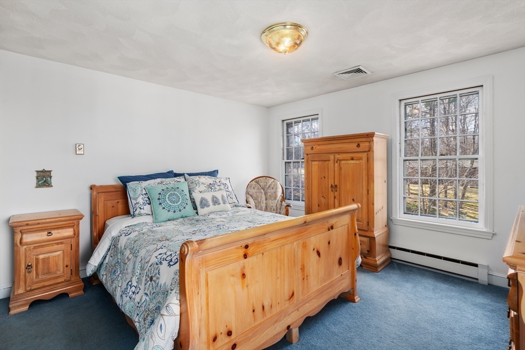4 Greybirch Road Andover, MA 01810 - Photo 28 of 42 a bed room with a bed and a window