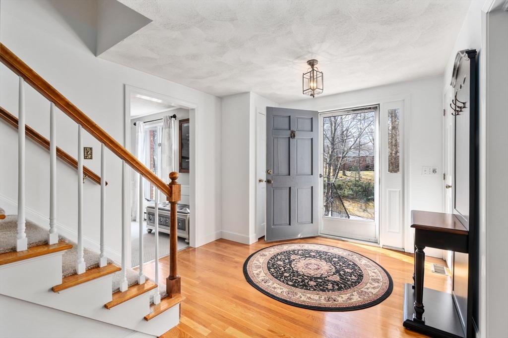 4 Greybirch Road Andover, MA 01810 - Photo 3 of 42 a view of a livingroom with furniture window and a rug