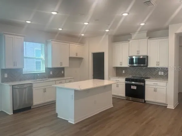 $499,990 | 5472 Hanover Square Drive, St. Cloud, FL 34771