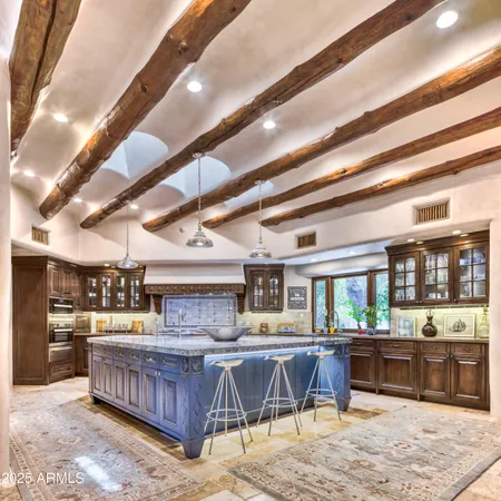 a living room with a couch and a stove