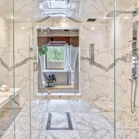 a view of a chairs and tables in the patio