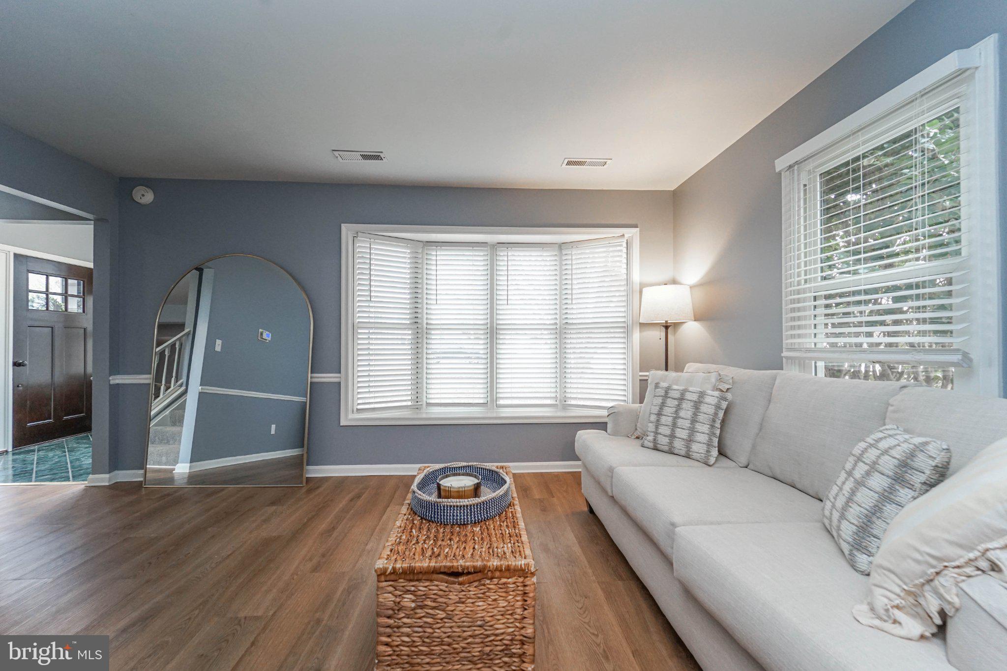211 Queen Anne Road Stevensville, MD 21666 - Photo 17 of 33 Bright and airy living space awaits.