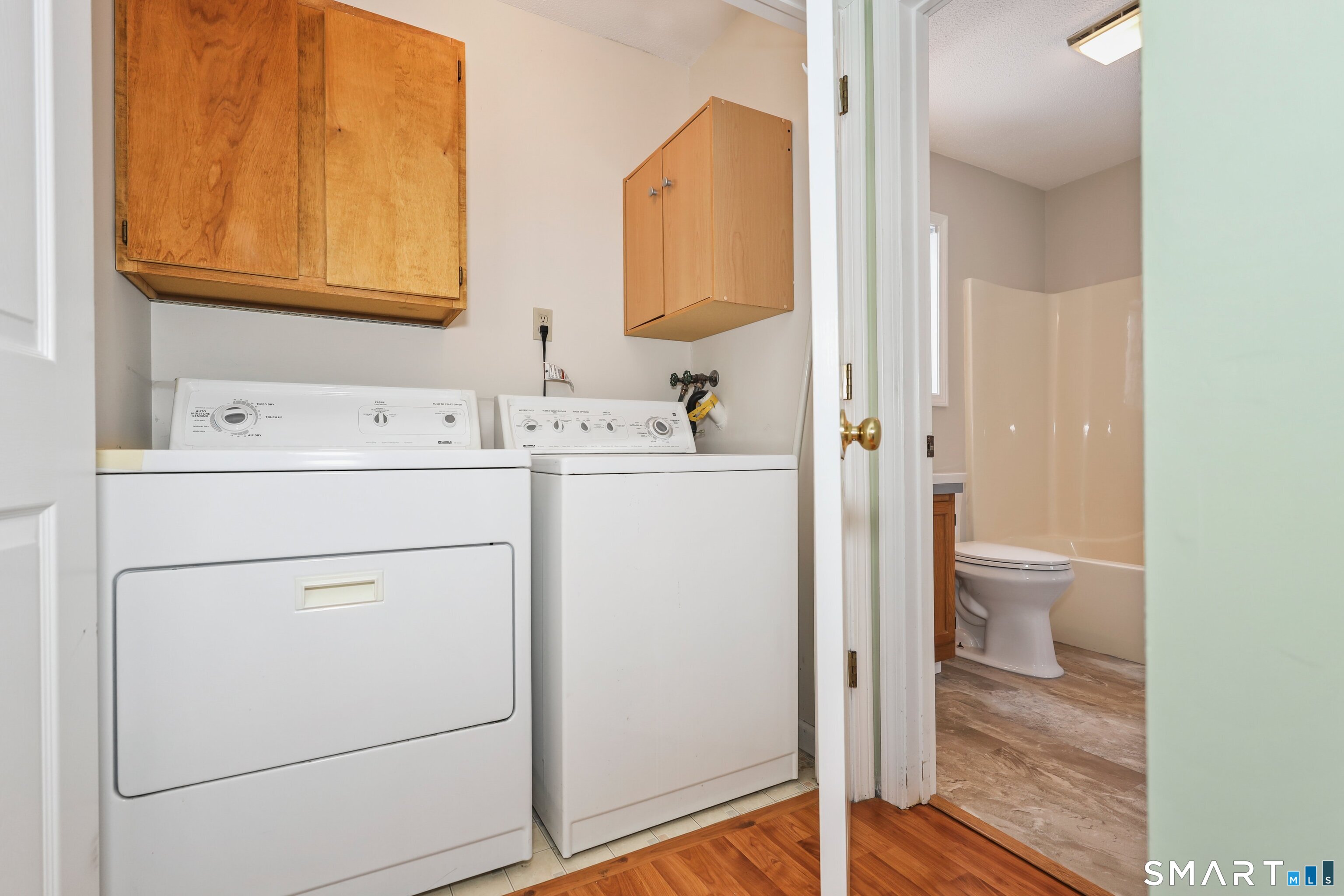86 Cannon Ridge Drive, Unit 86 Watertown, CT 06795 - Photo 21 of 37 Convenient laundry closet on first floor
