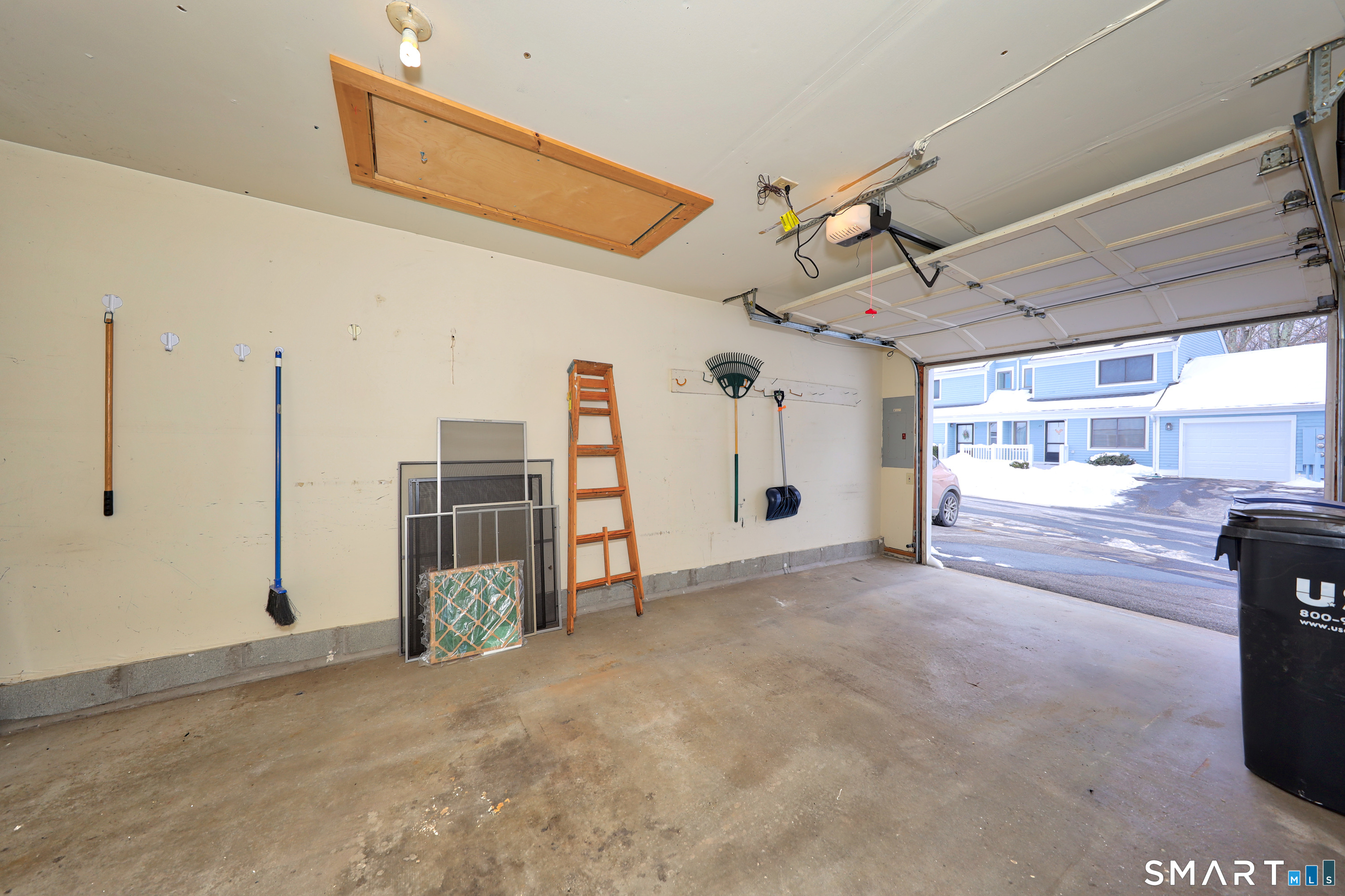 86 Cannon Ridge Drive, Unit 86 Watertown, CT 06795 - Photo 32 of 37 Garage with pull down attic above