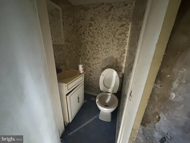 a view of bathroom with a toilet