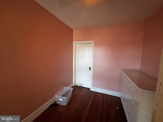 a view of small space with wooden floor