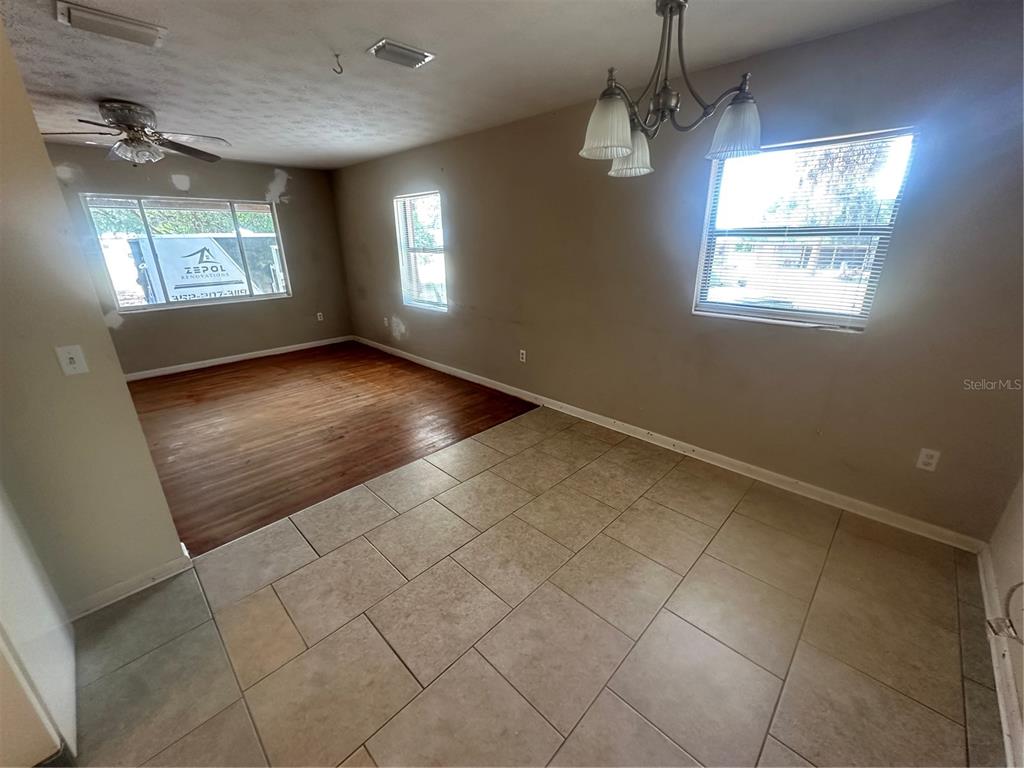 13449 Northeast Jacksonville Road Citra, FL 32113 - Photo 3 of 6 a view of an empty room with windows
