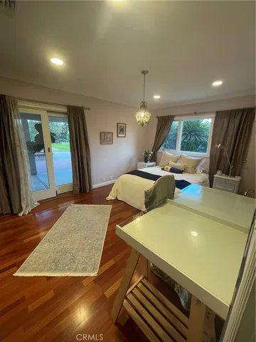 a view of a kitchen with two chairs
