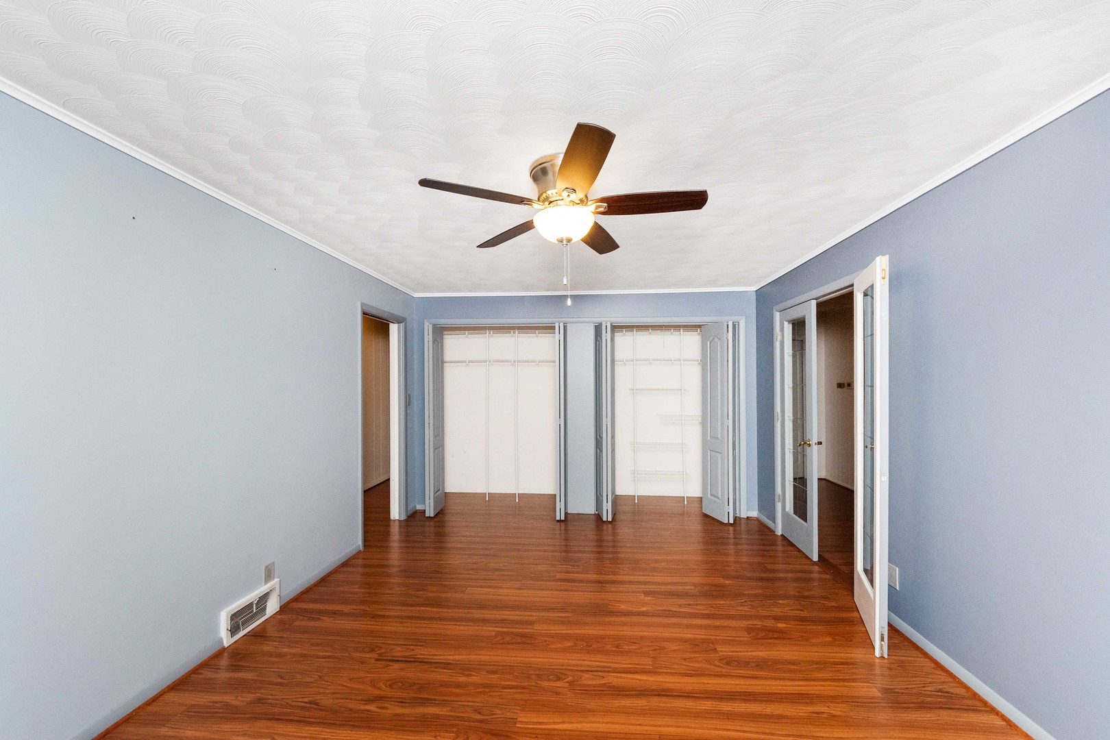 947 North 2nd Road Dana, IL 61321 - Photo 16 of 35 a view of an empty room with window and a ceiling fan