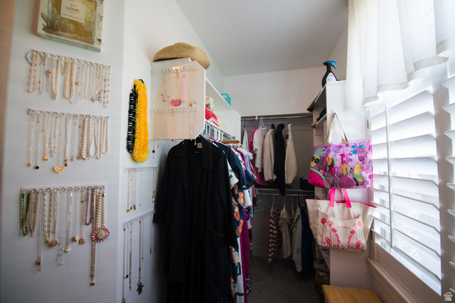 646 East 1400th Street North Mapleton, UT 84664 - Photo 28 of 78 Walk-in closet featuring built-in shelving, hanging rods, and window with plantation shutters