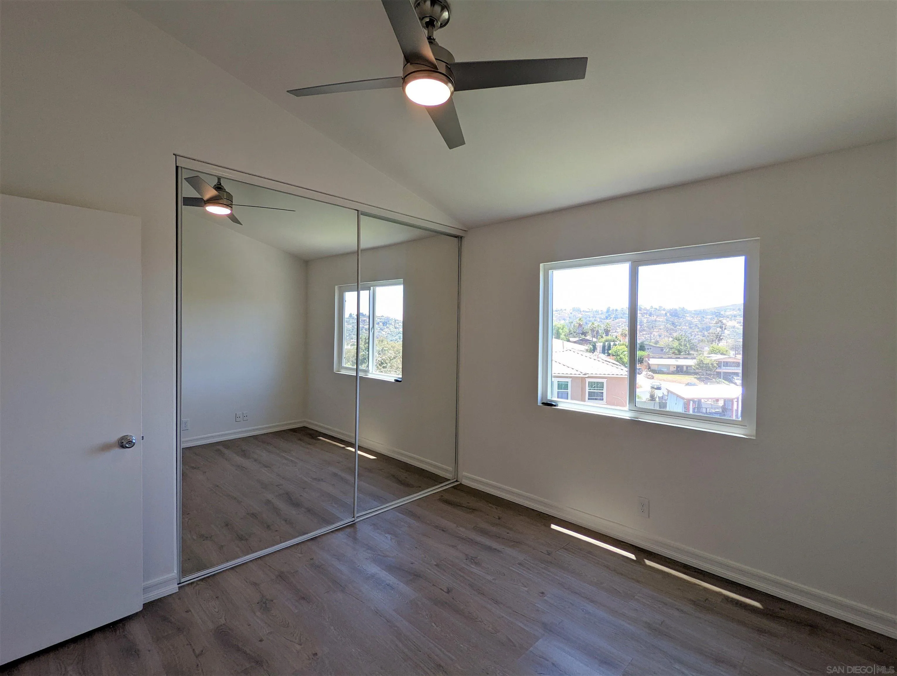 9347 Kahlua Way Spring Valley, CA 91977 - Photo 27 of 67 a view of an empty room with a window