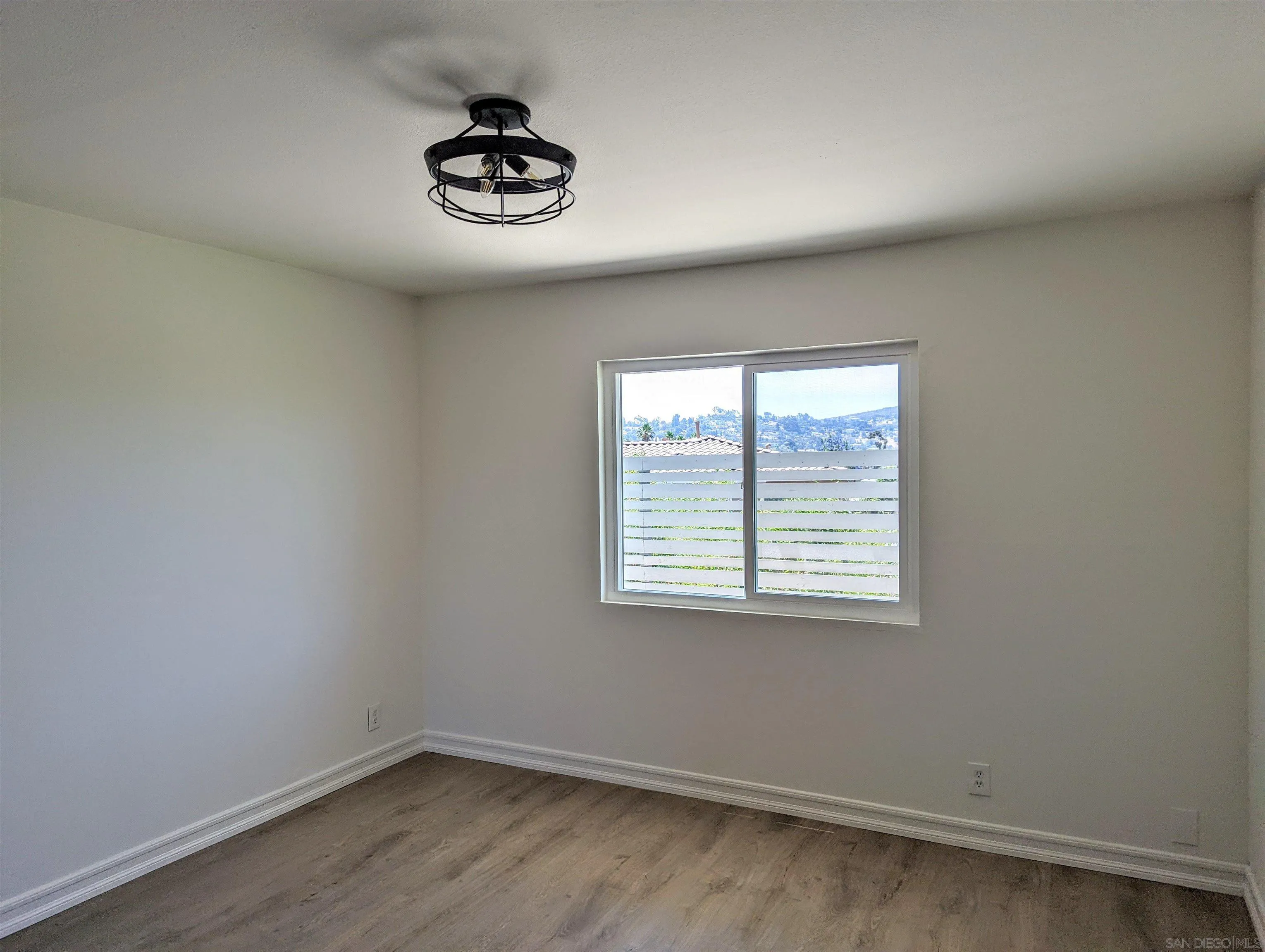 9347 Kahlua Way Spring Valley, CA 91977 - Photo 29 of 67 an empty room with a window