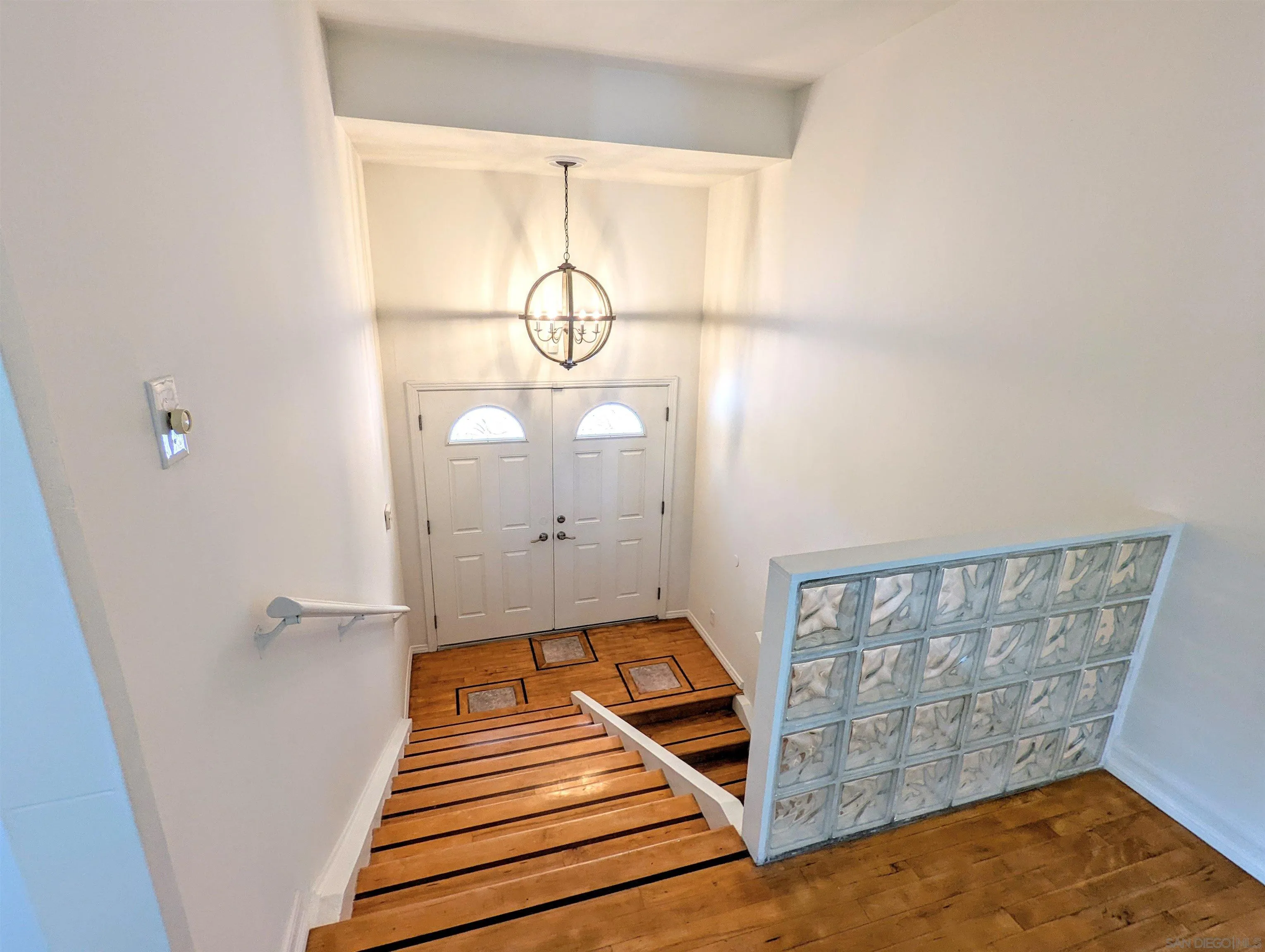 9347 Kahlua Way Spring Valley, CA 91977 - Photo 38 of 67 a view of an empty room with wooden floor
