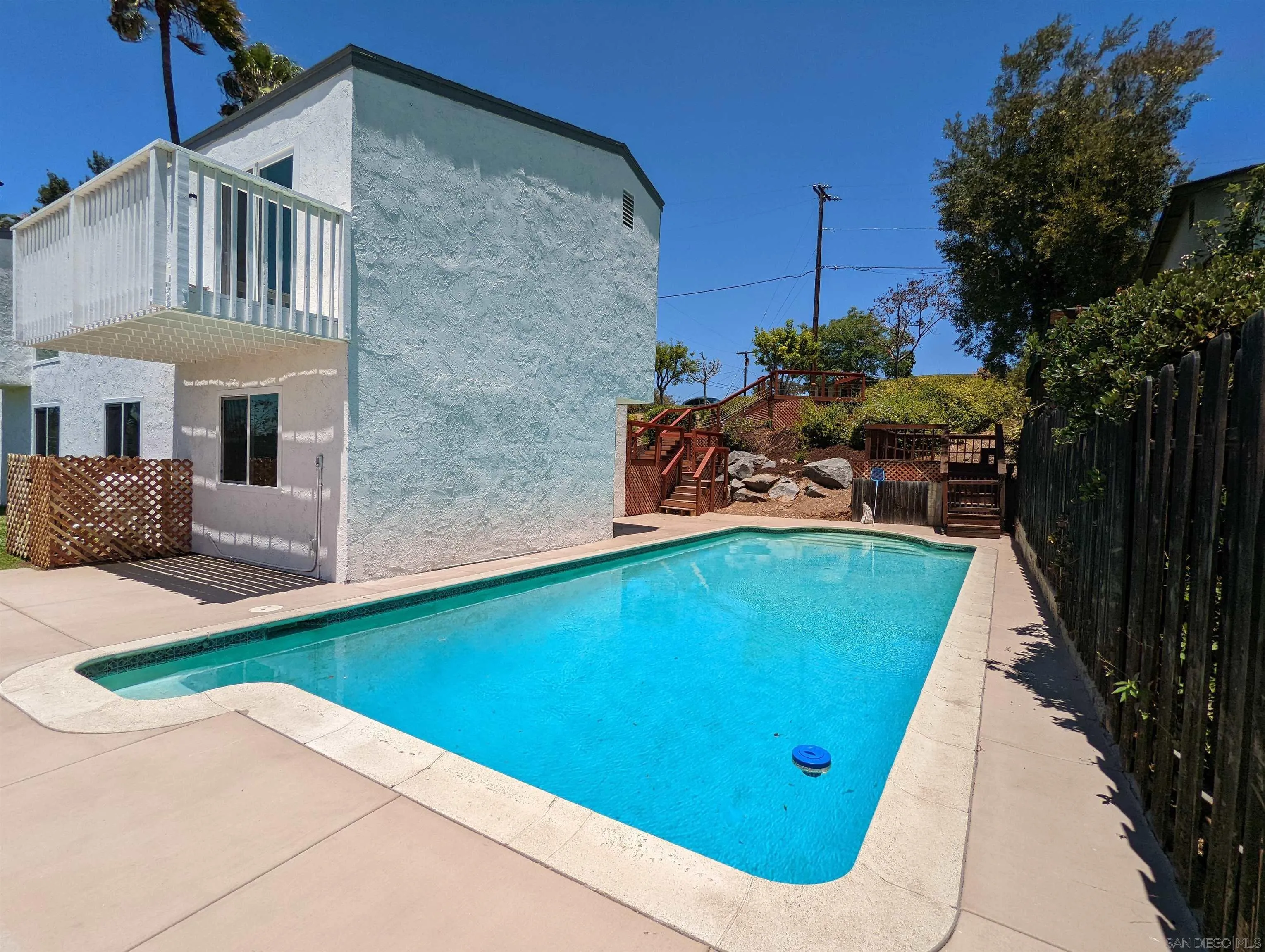 9347 Kahlua Way Spring Valley, CA 91977 - Photo 44 of 67 a view of a house with a swimming pool