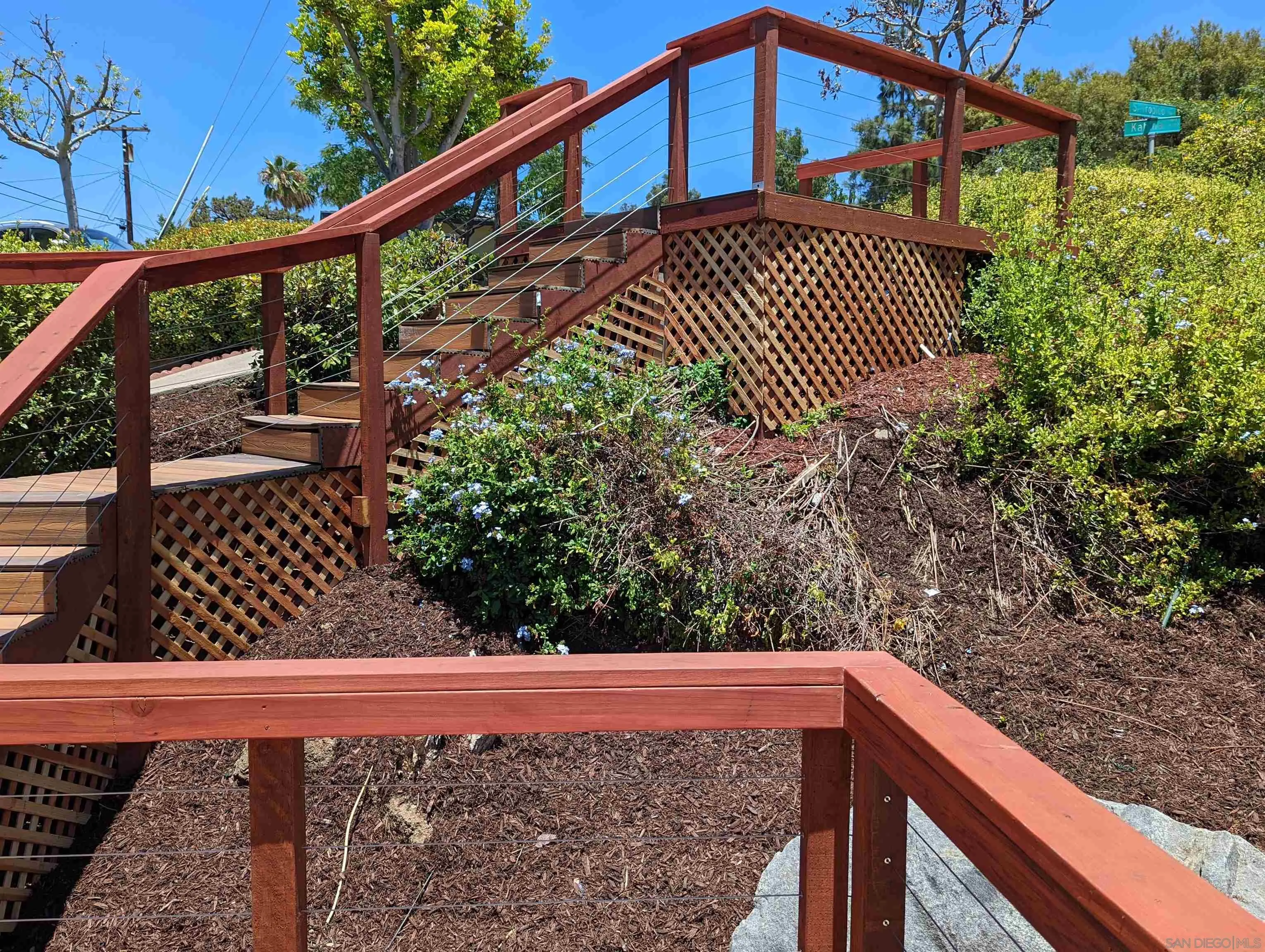 9347 Kahlua Way Spring Valley, CA 91977 - Photo 51 of 67 a view of balcony with wooden floor and fence
