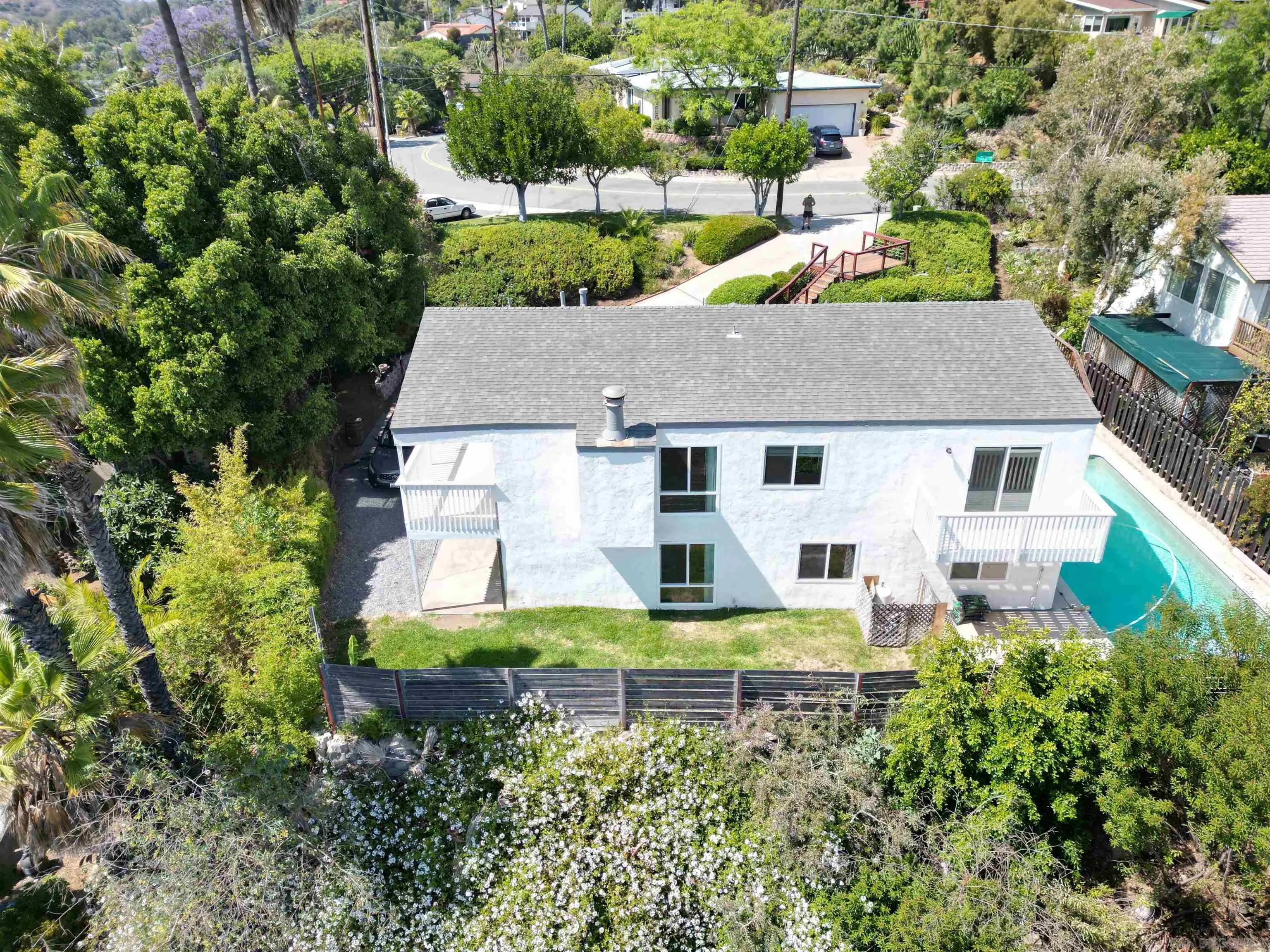 9347 Kahlua Way Spring Valley, CA 91977 - Photo 55 of 67 a aerial view of a house with a yard table and chairs