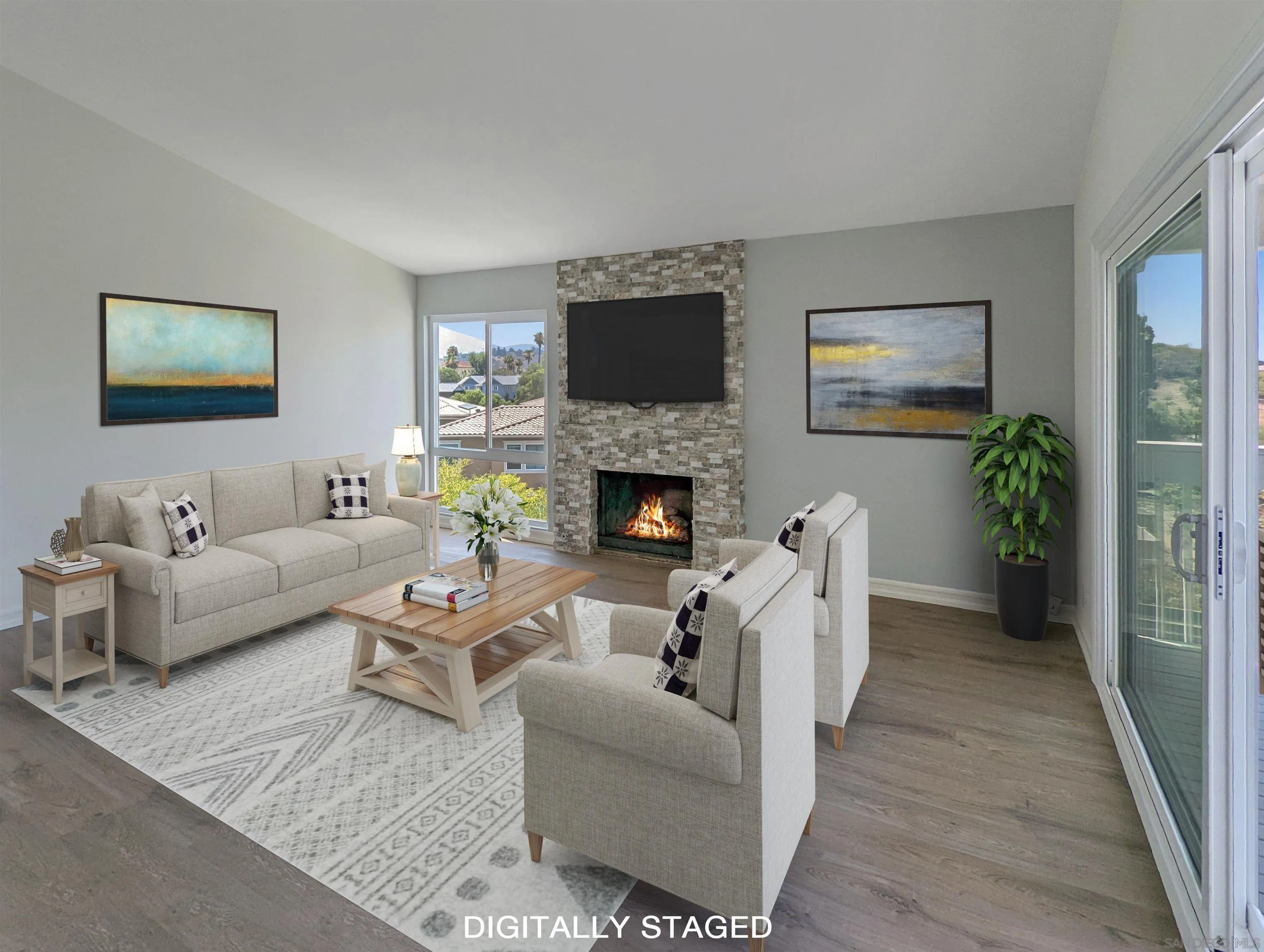 9347 Kahlua Way Spring Valley, CA 91977 - Photo 8 of 67 a living room with furniture and a fireplace