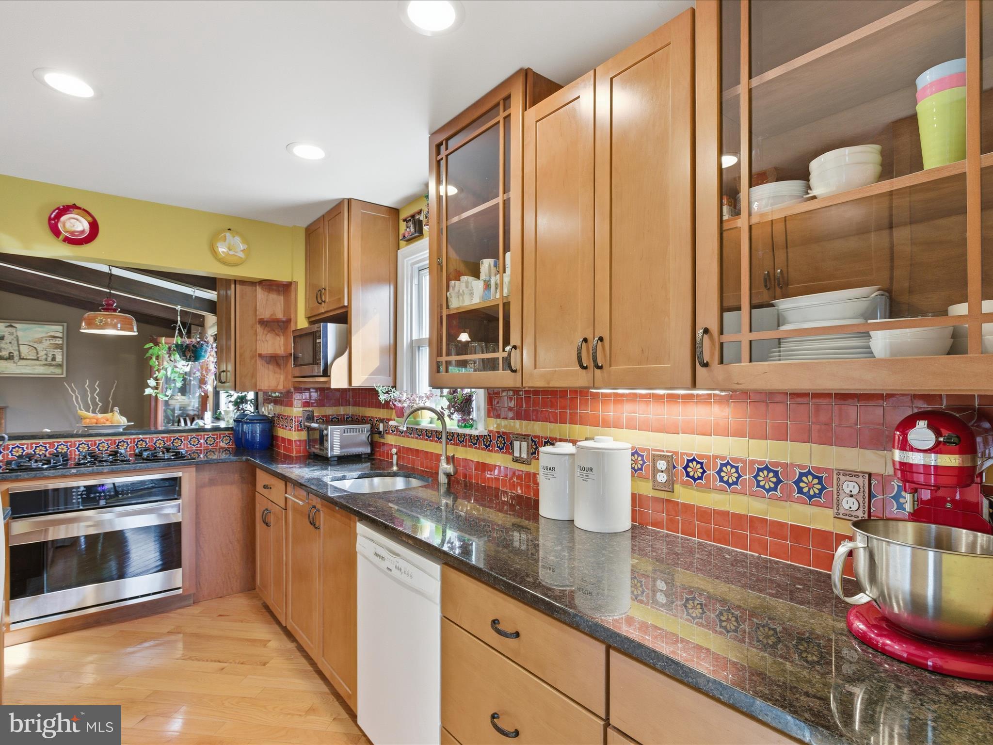2707 Lindell Street Silver Spring, MD 20902 - Photo 11 of 52 a kitchen with stainless steel appliances a sink and cabinets