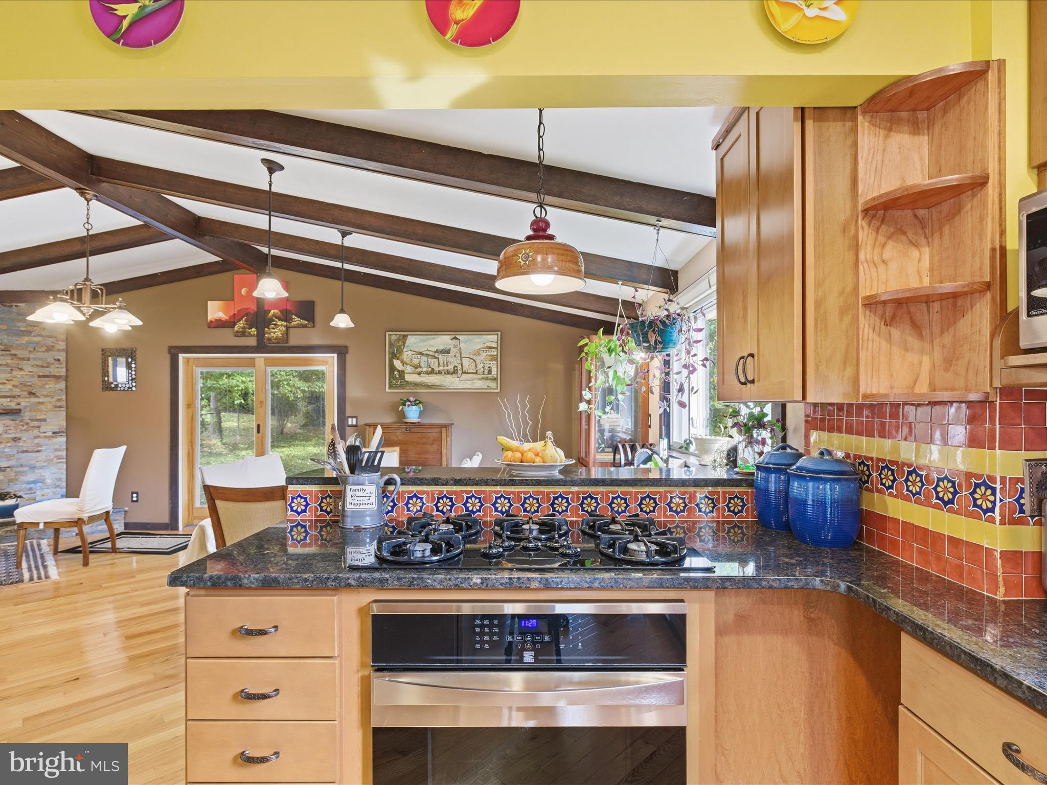 2707 Lindell Street Silver Spring, MD 20902 - Photo 13 of 52 a kitchen with stainless steel appliances granite countertop a stove and a sink