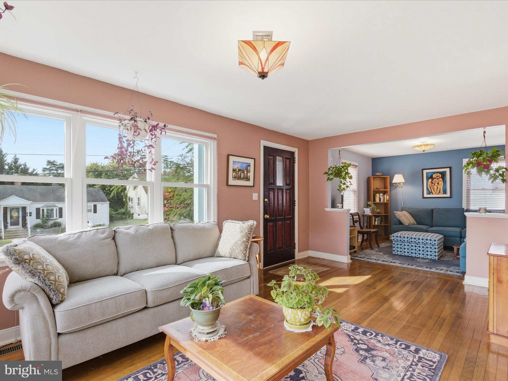2707 Lindell Street Silver Spring, MD 20902 - Photo 8 of 52 a living room with furniture and a large window