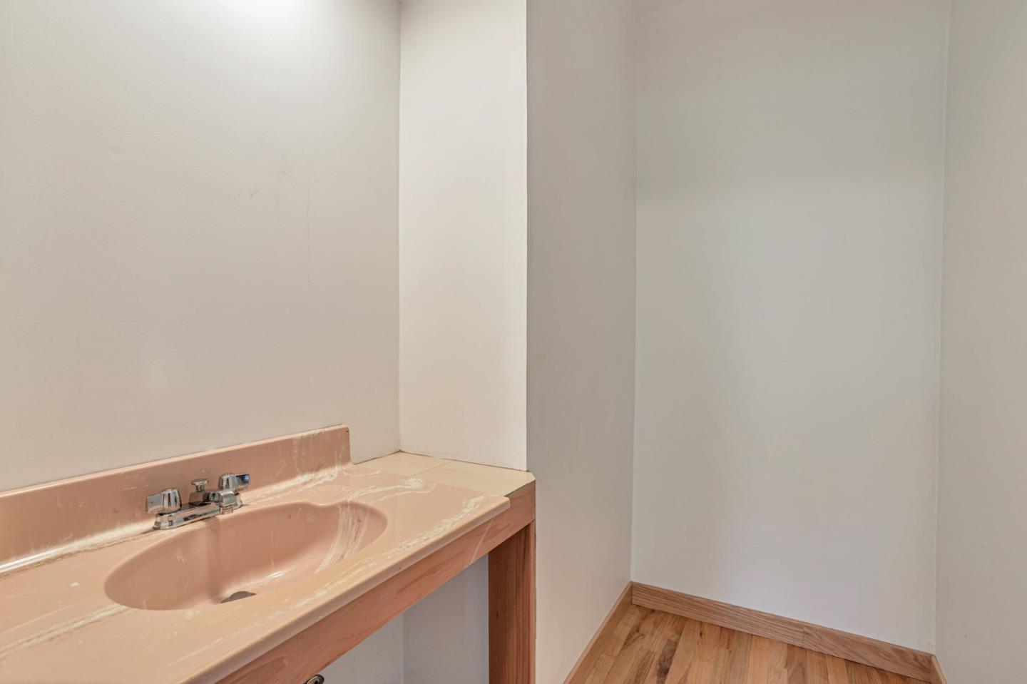 22178 Miller Ridge Road Los Gatos, CA 95033 - Photo 17 of 33 a bathroom with a sink and a mirror
