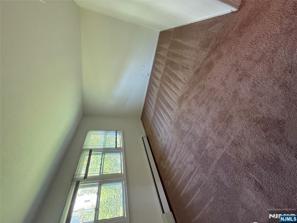 1276 River Road, Unit 2 Edgewater, NJ 07020 - Photo 12 of 16 an empty room with a window