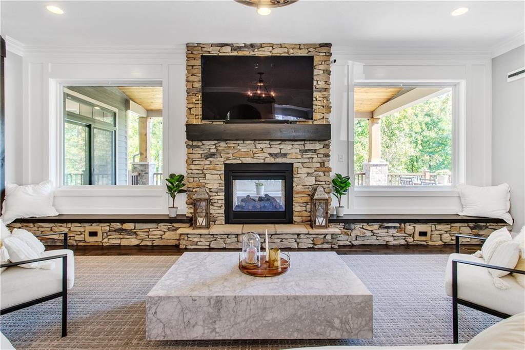 662 Chilliwack Lane Mars, PA 16046 - Photo 12 of 25 Gorgeous Living (Hearth Room) off of the kitchen with a shared fireplace to the covered rear deck!