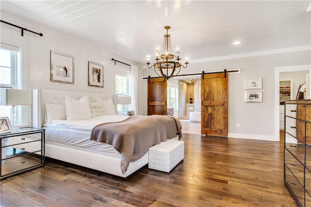 662 Chilliwack Lane Mars, PA 16046 - Photo 17 of 25 Lovely master suite with wood floors, double walk-in closets, barn doors and a spa like bath!