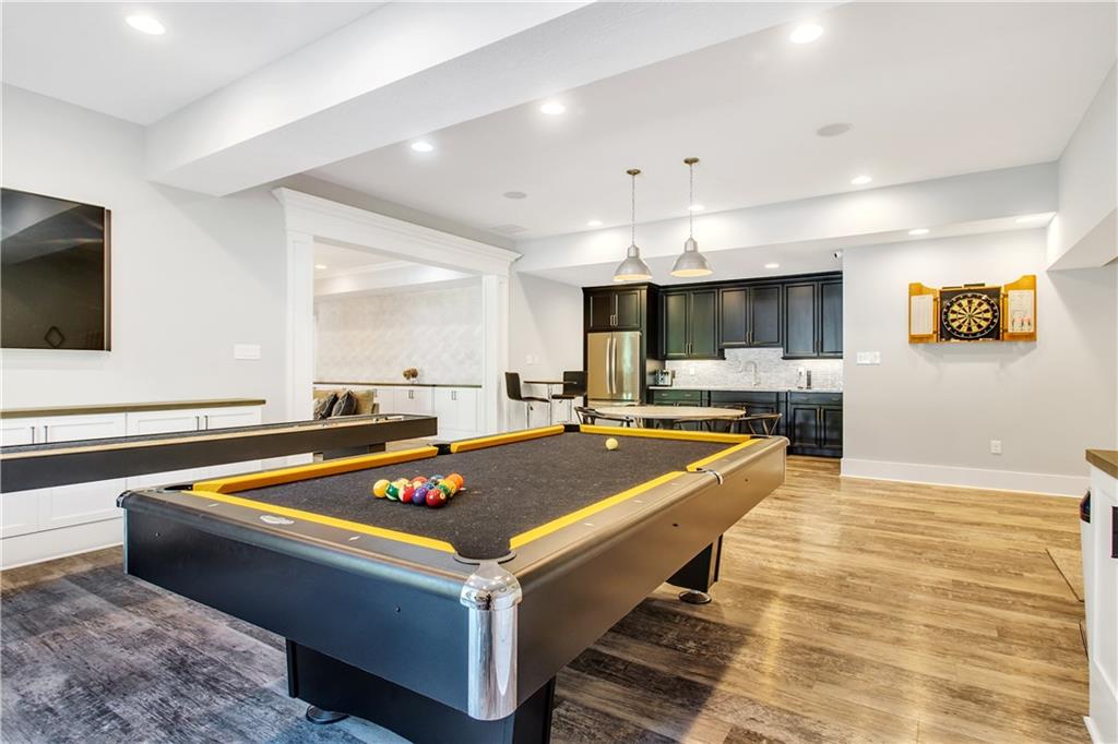 662 Chilliwack Lane Mars, PA 16046 - Photo 22 of 25 Huge lower-level game room with Kitchenette! Open concept to the theater room, Hearth room, and a huge multi-purpose room (this would make a great fitness room).