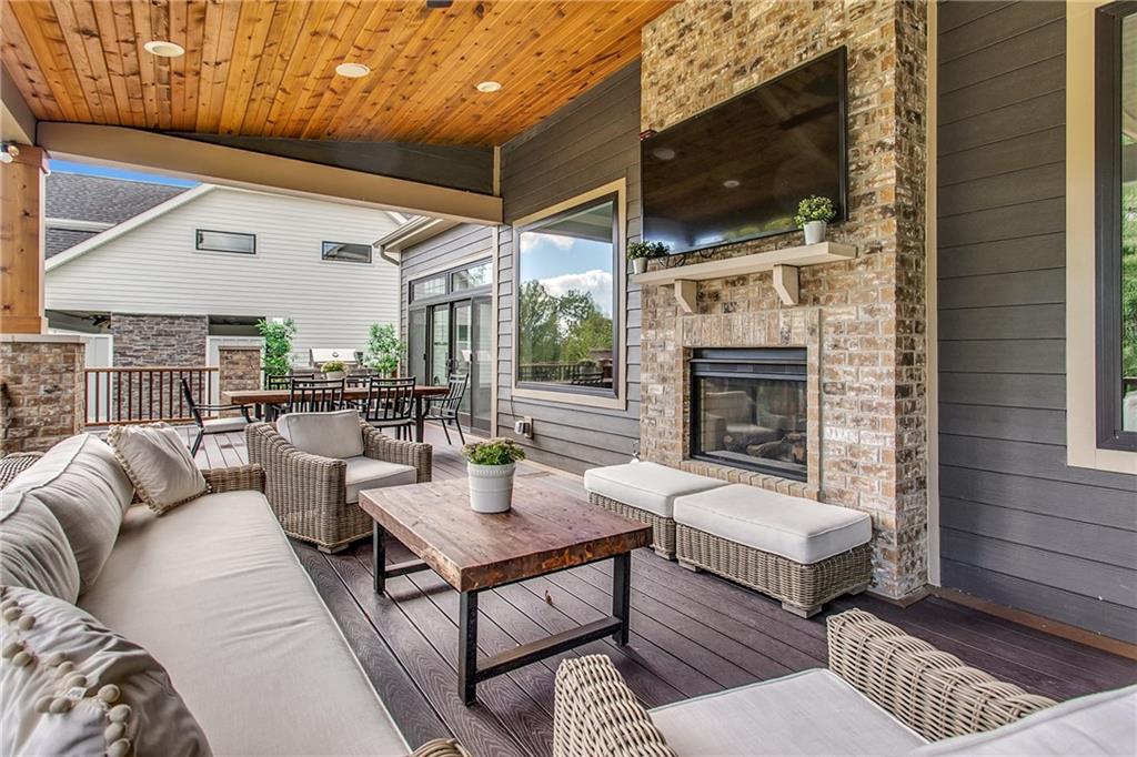 662 Chilliwack Lane Mars, PA 16046 - Photo 6 of 25 Covered rear patio with shared gas fireplace.