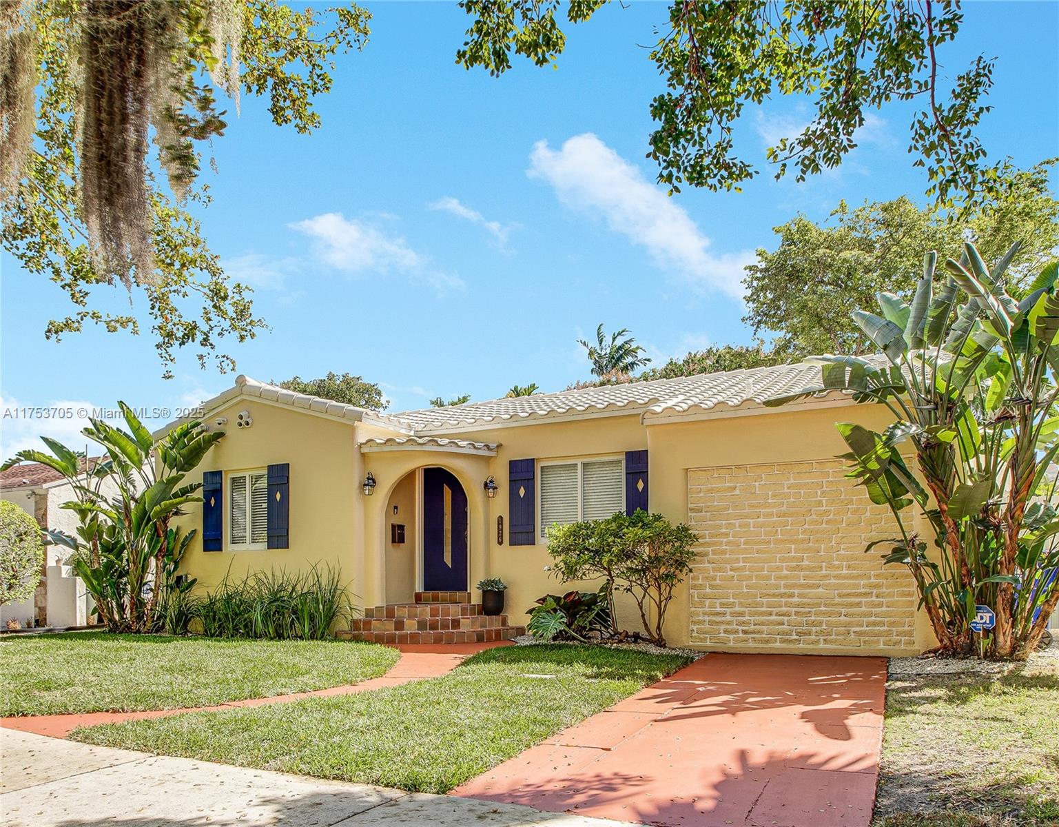 1926 Southwest 17th Terrace Miami, FL 33145 - Photo 1 of 38 a front view of a house with a yard