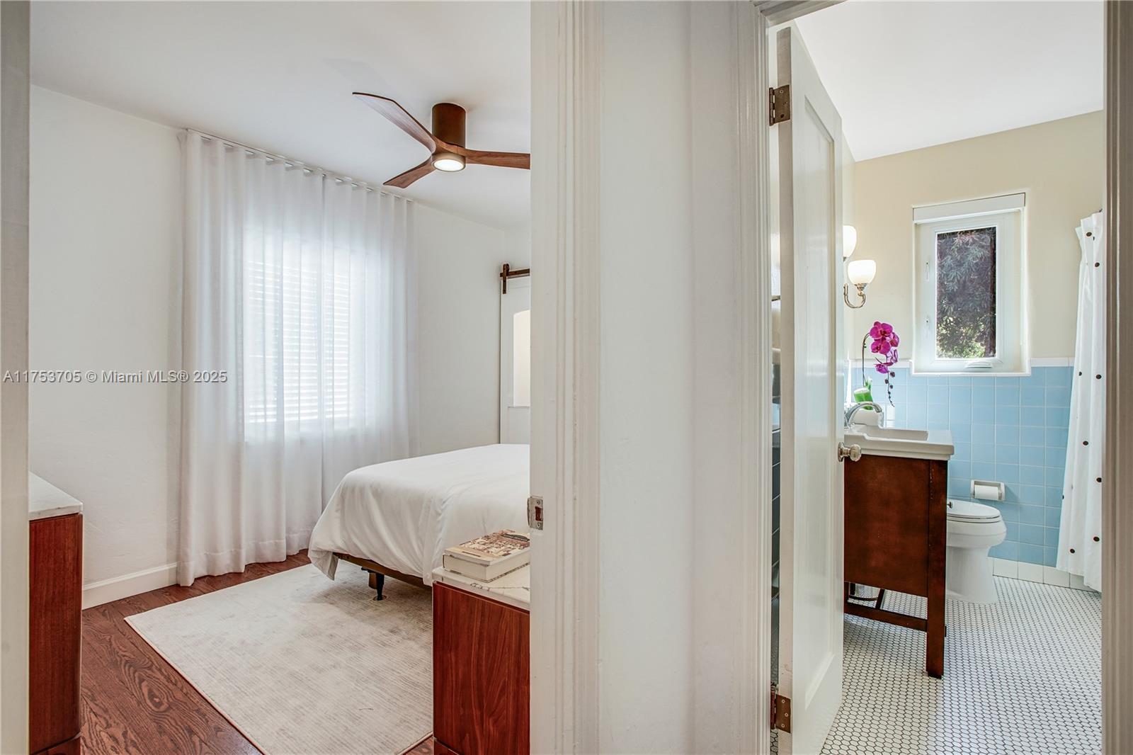 1926 Southwest 17th Terrace Miami, FL 33145 - Photo 19 of 38 a bedroom with a bed and a dresser