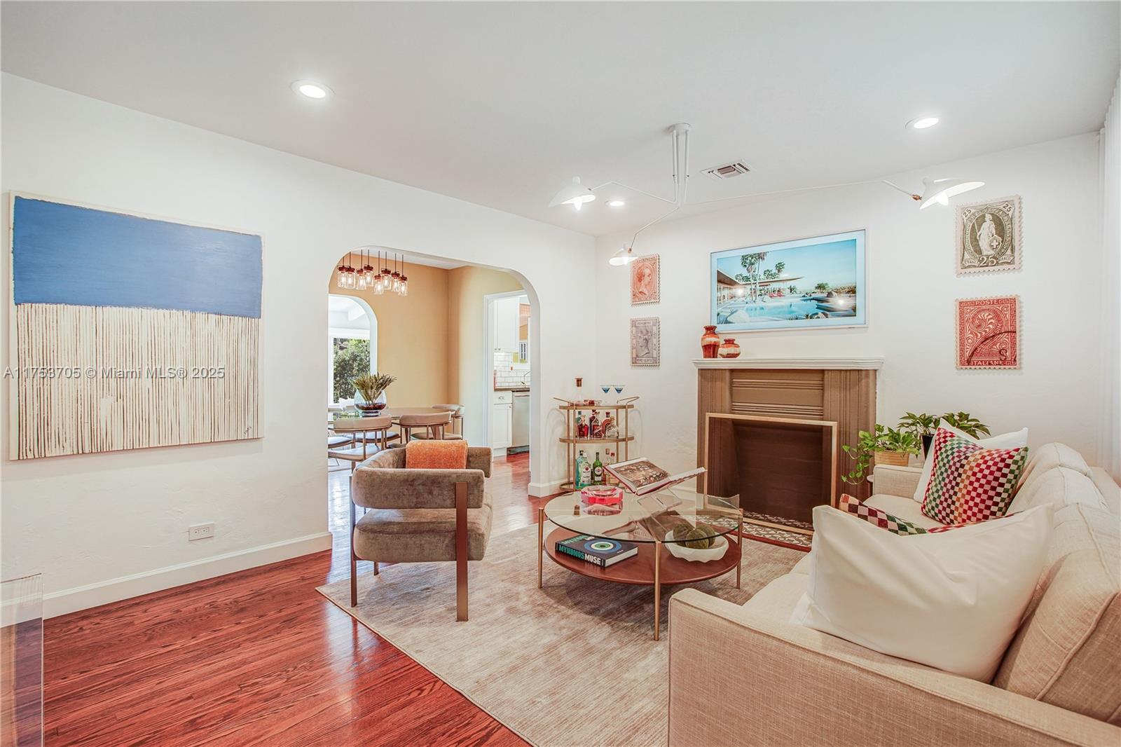 1926 Southwest 17th Terrace Miami, FL 33145 - Photo 2 of 38 a living room with furniture and a fireplace