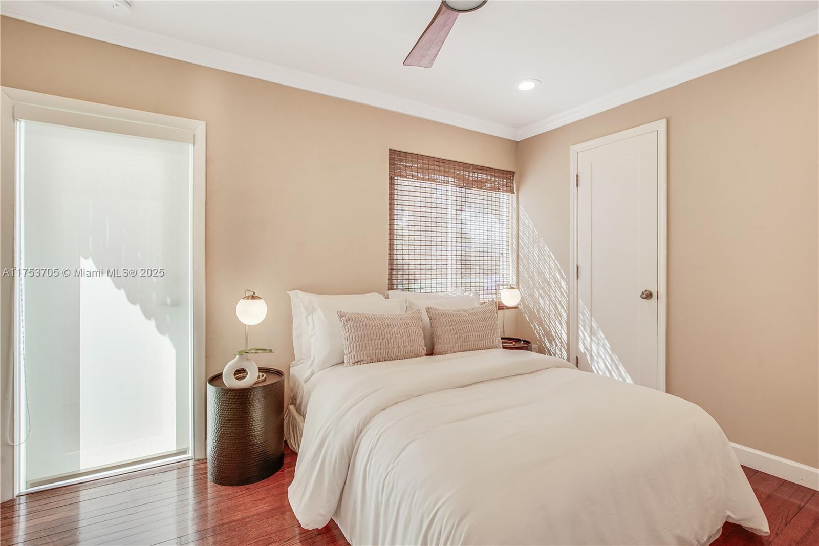1926 Southwest 17th Terrace Miami, FL 33145 - Photo 23 of 38 a bedroom with a large bed and window