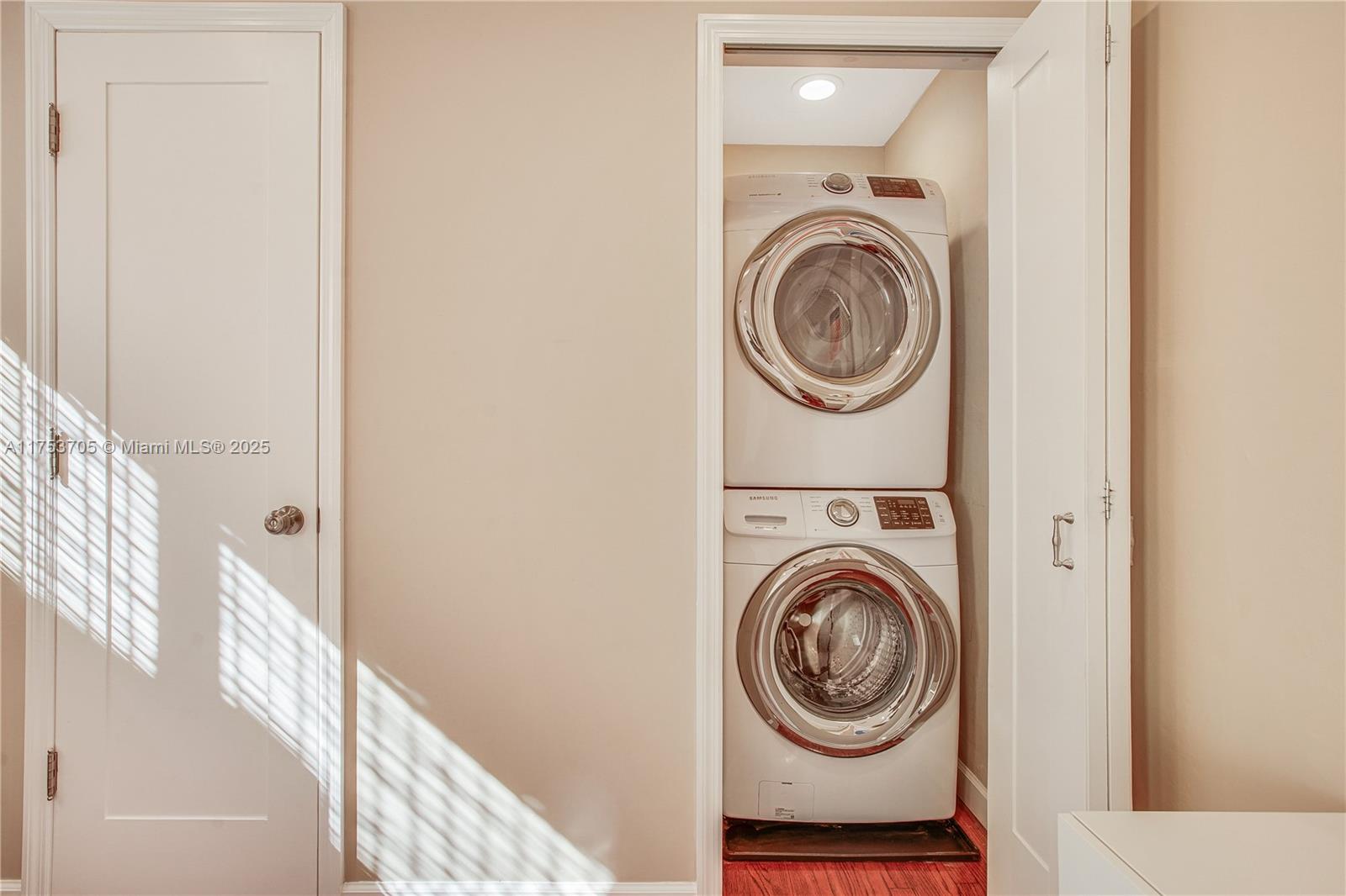 1926 Southwest 17th Terrace Miami, FL 33145 - Photo 25 of 38 a view of washer and dryer in a utility room